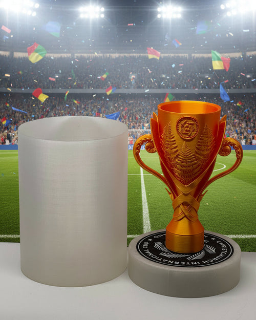 Gold trophy on a white cylindrical base against a light gray background