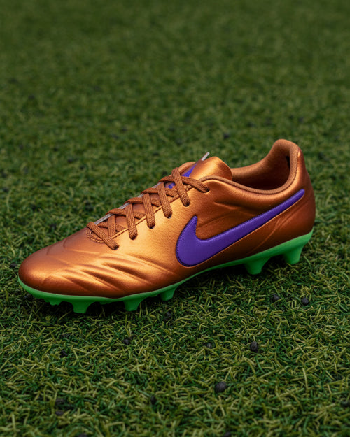 Bronze-colored shoe with a purple swoosh logo on a white background