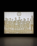 Vintage-style photo of a group of people with a decorative border on a dark background