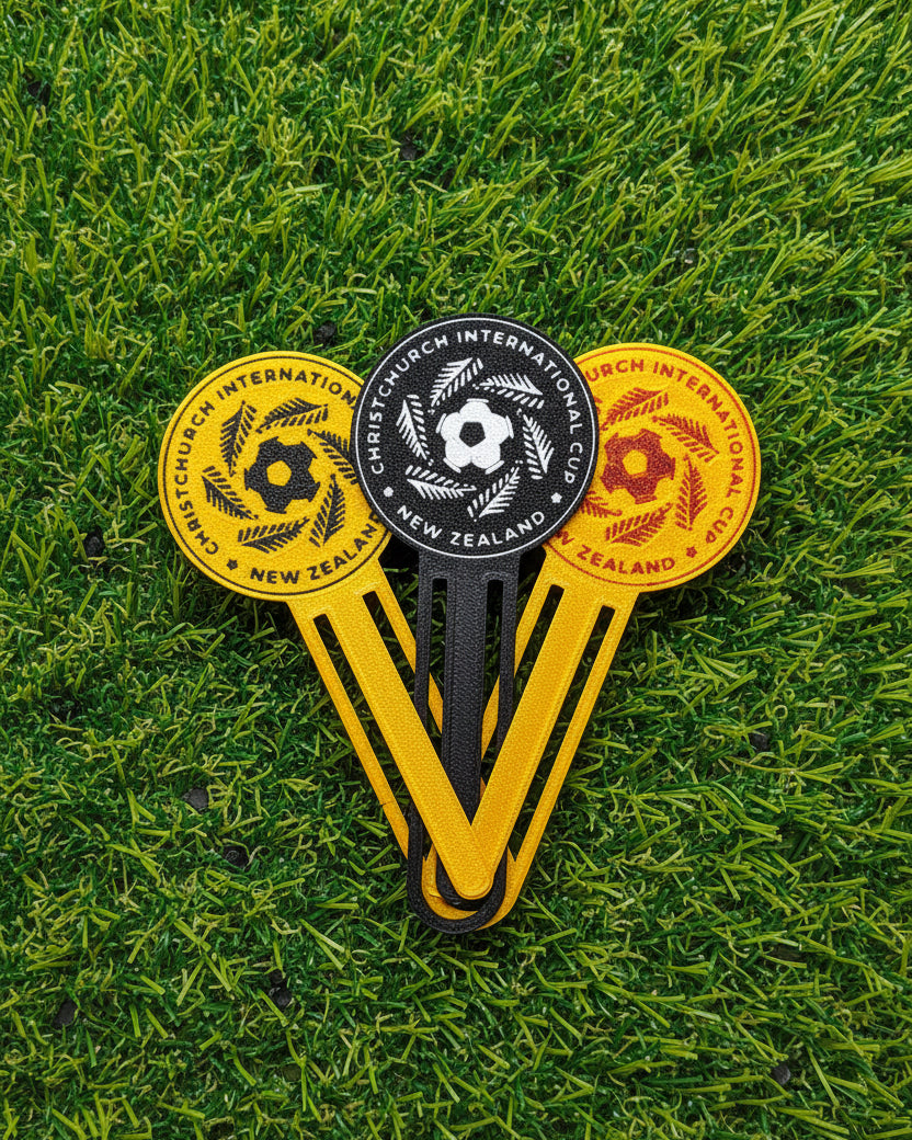 Three yellow and black sports markers with branding on a white background