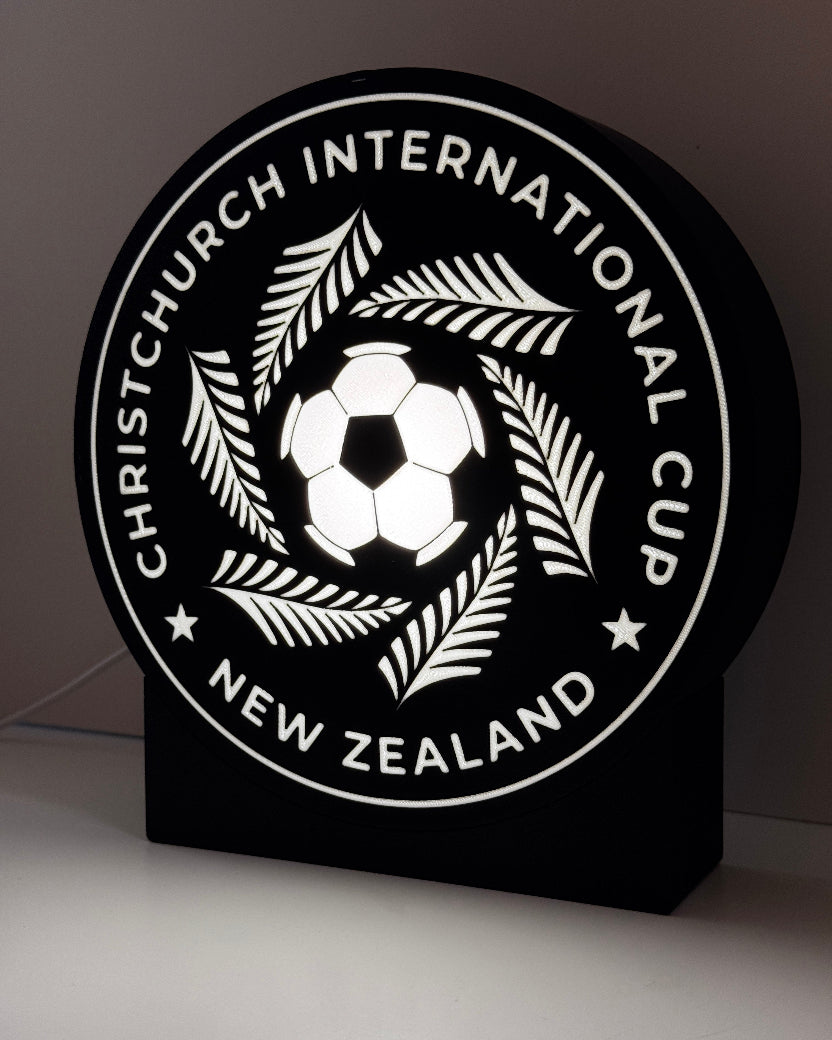 Logo of the International Cup Christchurch New Zealand on a black background