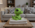 Green knitted toy dinosaur on a light gray background